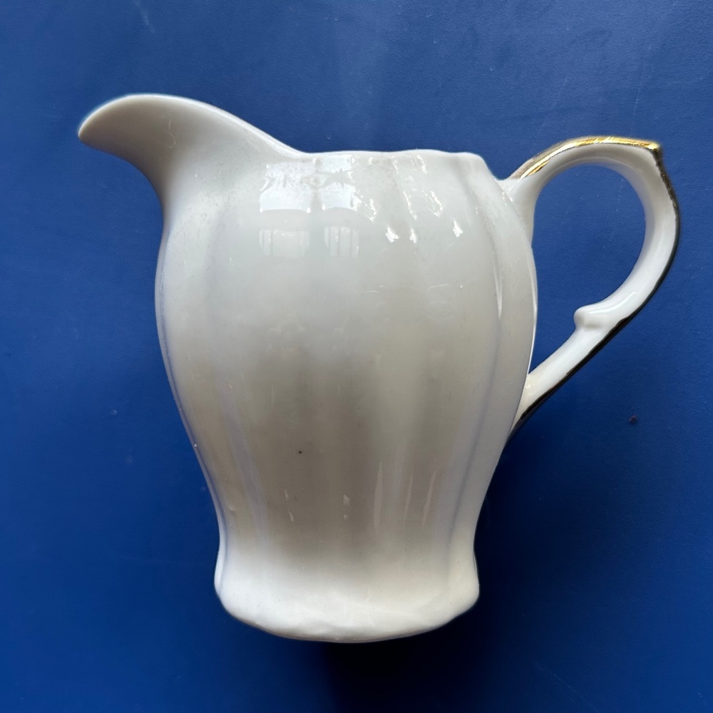 Grace Teaware Ivory Creamer with Gold Trim